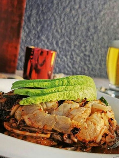 Una foto de Camarones al ajillo
