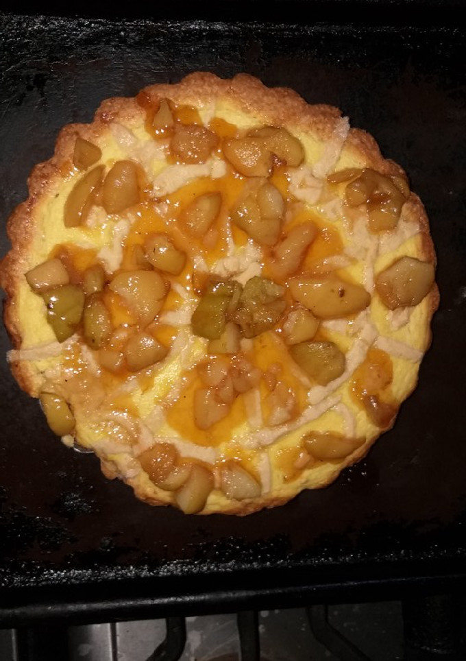 Una foto de Tarta de ricota, duraznos y mantequilla de maní