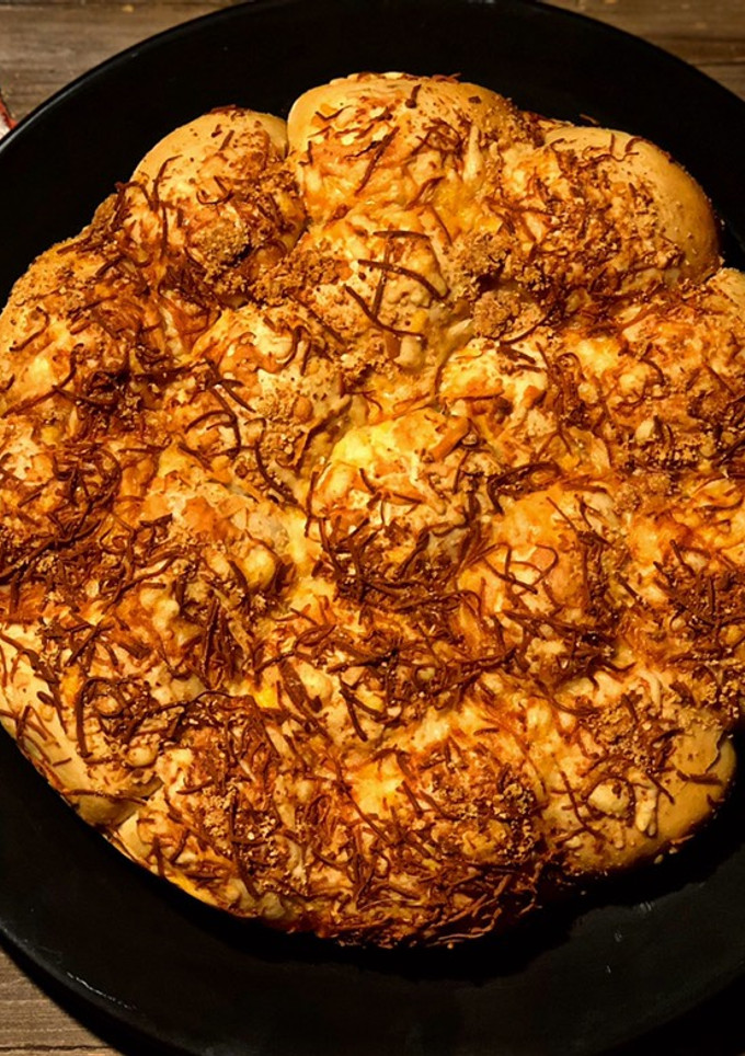 Una foto de Pizza roll con jamón y queso