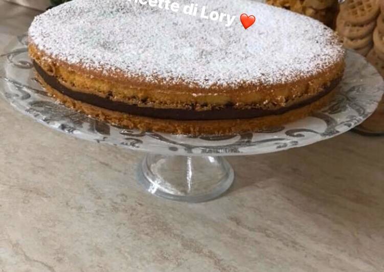 Crostata morbida con nutella 
(Crema,marmellata)
Soffice e buonissima 😋
