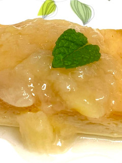 A picture of Baked Cheesecake & Peach Chardonnay Sauce.