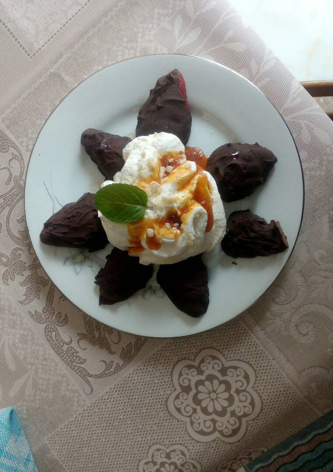 A picture of Strawberries with Chocolate and Caramel Whipped Cream.