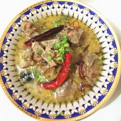 A picture of White mutton korma.