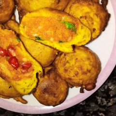 Batata vada with surprise inside A picture of Batata vada with surprise inside.
