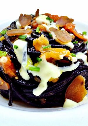 A picture of Squid Ink Spaghetti with Shallot Cream and Bottarga.