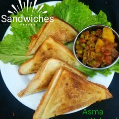 A picture of Cheese & veggies sandwiches.