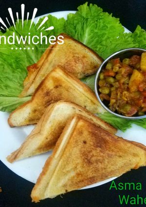 A picture of Cheese & veggies sandwiches.