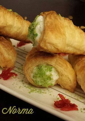 A picture of Puff Pastry Cones with Cream.