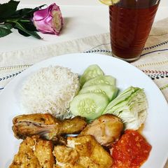 A picture of Ayam Penyet (Squeeze Chicken).