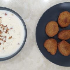 A picture of Gulgule with Kheer.