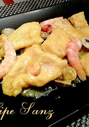 Una foto de Filetes bacalao fresco en salsa con marisco