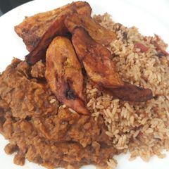 A picture of Porriage beans,jollof rice with fried plantain.