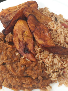 A picture of Porriage beans,jollof rice with fried plantain.