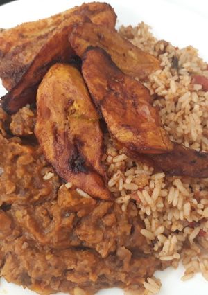 A picture of Porriage beans,jollof rice with fried plantain.