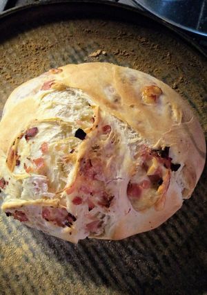 Una foto de Pan casero relleno de jamón y queso, con harina Pureza