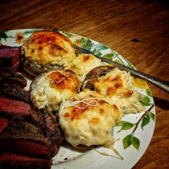 A picture of White Cheddar Crab Stuffed Mushrooms.