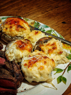A picture of White Cheddar Crab Stuffed Mushrooms.
