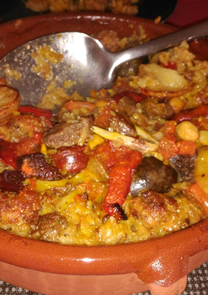 Una foto de Arroz de pringá al horno - receta de aprovechamiento con cocido
