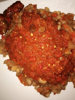 A picture of White beans with palm oil stew.