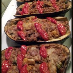 A picture of AMIEs Eggplants Stuffed with Sausage.