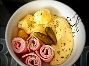 Une photo de fromage raclette
