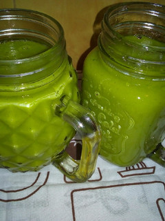 A picture of Banana mango spinach smoothie.