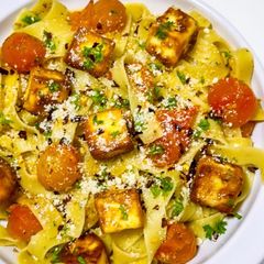 Fettuccine Aglio e Olio with Cherry Tomatoes and Halloumi Cubes A picture of Fettuccine Aglio e Olio with Cherry Tomatoes and Halloumi Cubes.