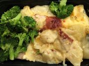 A picture of scalloped potatoes and ham