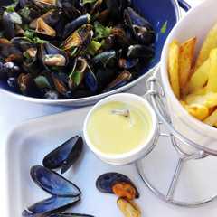 Una foto de Mejillones al vino blanco