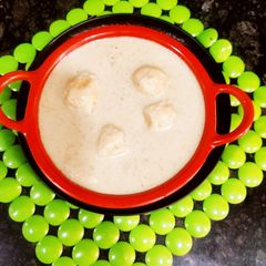 A picture of White gravy kashmiri Aloo Dum.