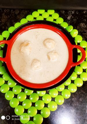 A picture of White gravy kashmiri Aloo Dum.