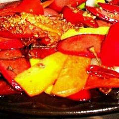 A picture of sizzling hotdogs.