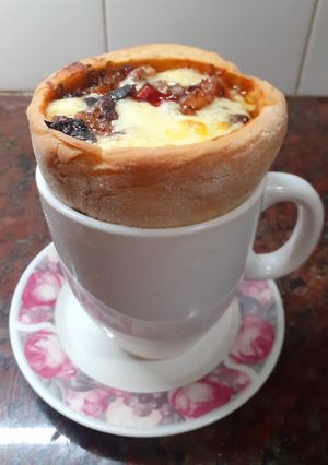 Una foto de Pizza en taza