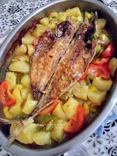 Una foto de Cazuela de jurel negro de sangre al fish masala