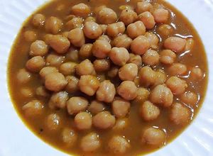 Foto principal de Garbanzos lechosos al curry hingú y baharat