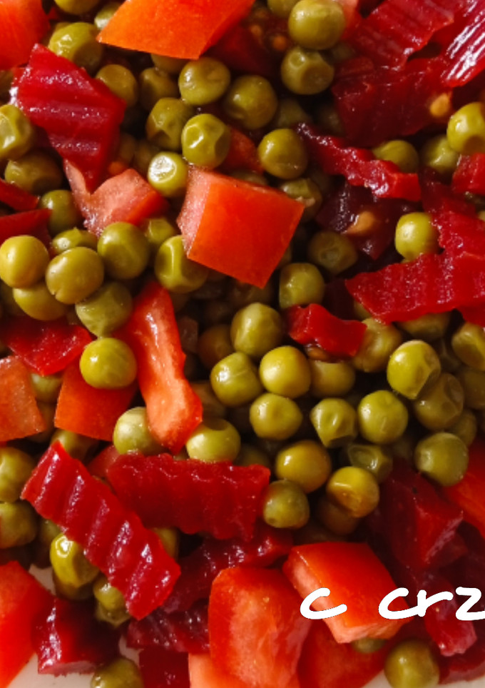 Una foto de Guisantes con remolacha y tomate