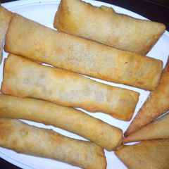 A picture of Home made spring rolls and samosa.