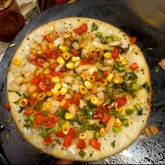 A picture of Singhada veg uttapam.