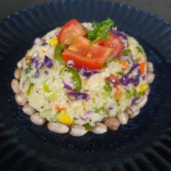 A picture of Broken wheat Vegetable upma.