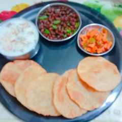 A picture of Delicious tasty kheer Puri kala chana for Durga Mata Bhog Prasad.