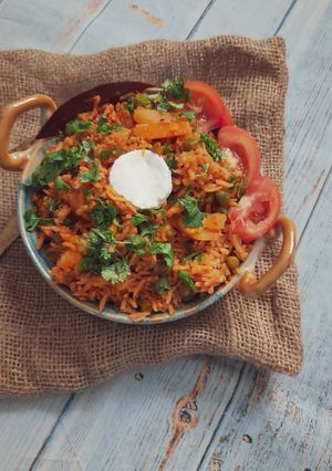 A picture of Tomato Rice pulao.
