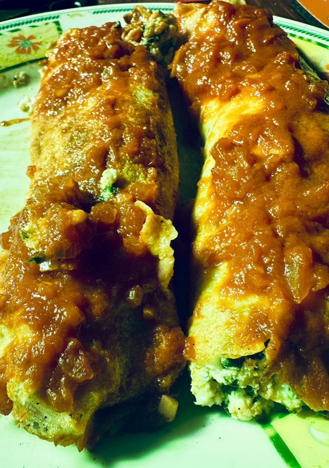 Una foto de Canelones de ricota y espinaca