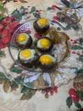 Champiñones rellenos de queso y huevos de codorniz