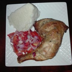 A picture of Grilled chicken, Kachumbari and Ugali #Chickencontest#.