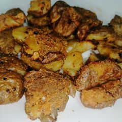 A picture of Cheesy smashed potatoes.