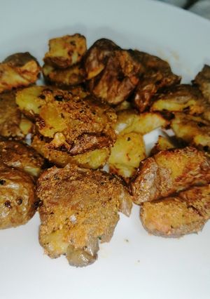 A picture of Cheesy smashed potatoes.