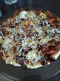 Une photo de Pizza sans coulis de tomates