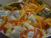 Una foto de escabeche de pimientos