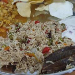 A picture of #Cook pad india# vegetable Biryani,kabuli chana,raitha,papad.
