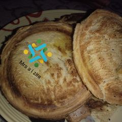 A picture of Toasted bread using manual toaster.